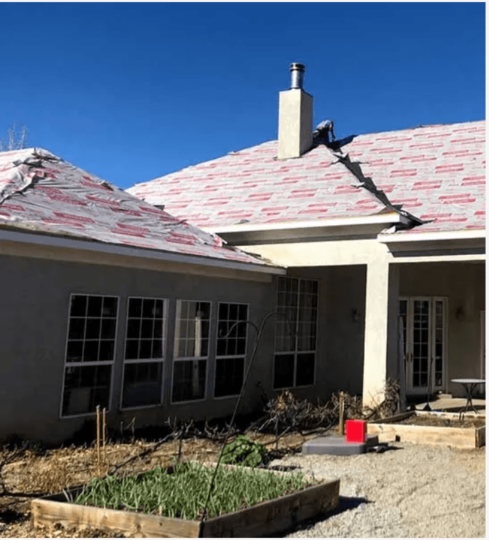 Shingle roof replacement in progress — tear-off and underlayment by Alliance Construction Services